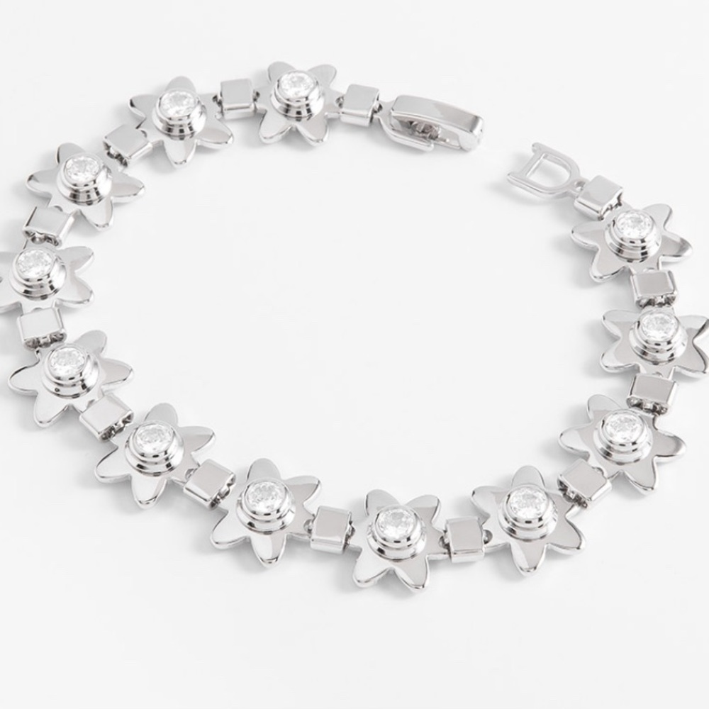 Rhodium plated floral bracelet with Swarovski crystals in each  flower NWT